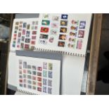 A large collection of world stamps in 3 albums