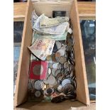 A box of world coins and bank notes