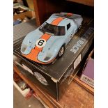 A metal die cast 1:24 scale model of a Gulf Racing Ford GT-40 (boxed)