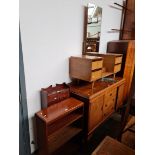 A mahogany sideboard, a mid 20th century dressing table and two mahogany bookcases.