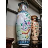 A large 20th century Chinese vase decorated with exotic birds, plants and flowers, height 108cm.