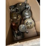 A box of metalware including brass plates, kettle, pewter teapots etc