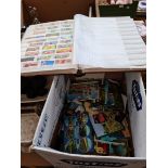 A box of postcards and matchbox labels, etc.