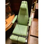 A mid 20th century adjustable barber's chair by Takara Belmont Co, Japan.