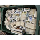 A box of trade cards, mainly Brooke Bond tea cards