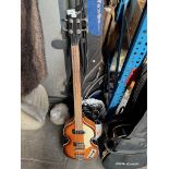 A Westfield Hofner style bass guitar in Roksak guitar bag and bag of guitar straps etc