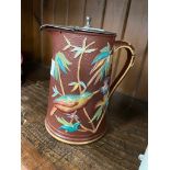 F R Pratt & Co Aesthetic Movement jug, decorated with plants and birds.