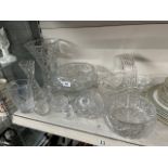 A collection of crystal including heavy vase and bowl, other bowls, vases and basket