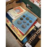 A box coin and clock books