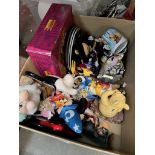 A box of Disney character collectables