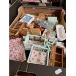 A box of doll's furniture.