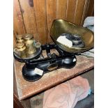 A set of kitchen scales including metric and imperial weights