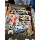 A box of postcards.