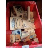 A box of arts and crafts wooden printing blocks.