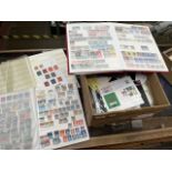 A box of stamp albums and covers