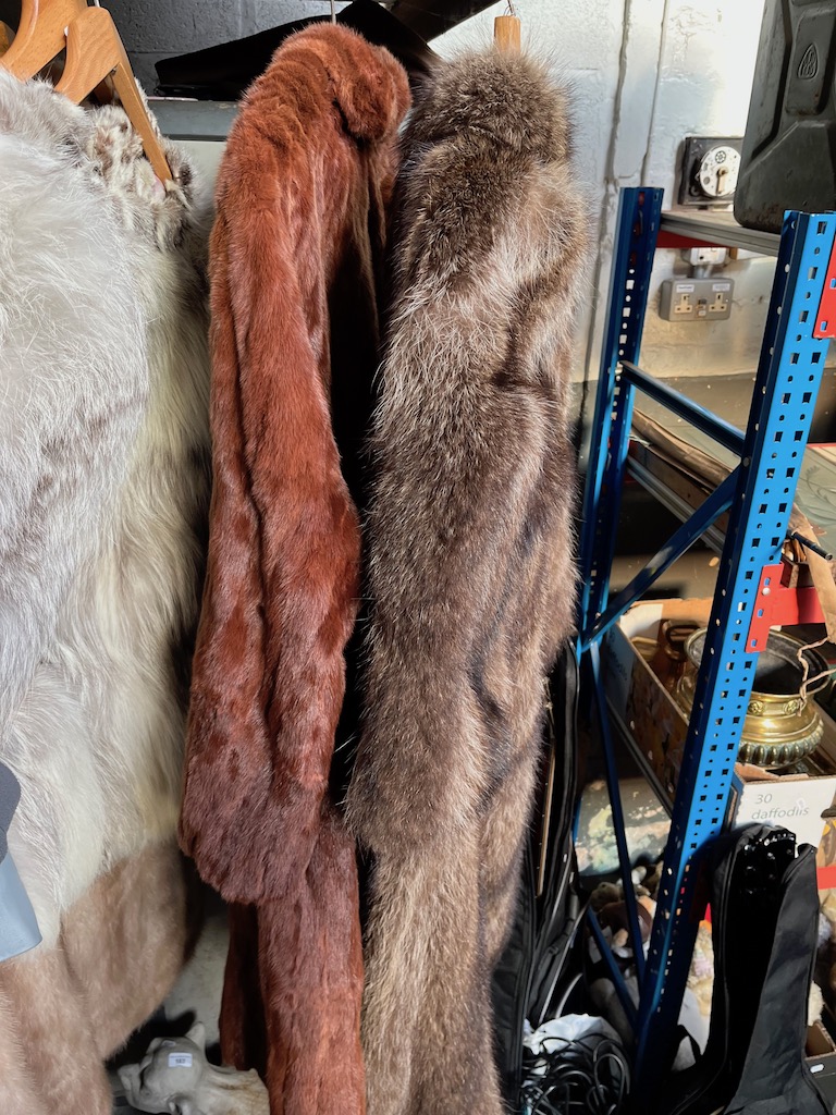 2 fur coats.