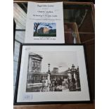 A framed photograph depicting the a Sikorsky Helicopter carrying the Duke of Edinburgh.