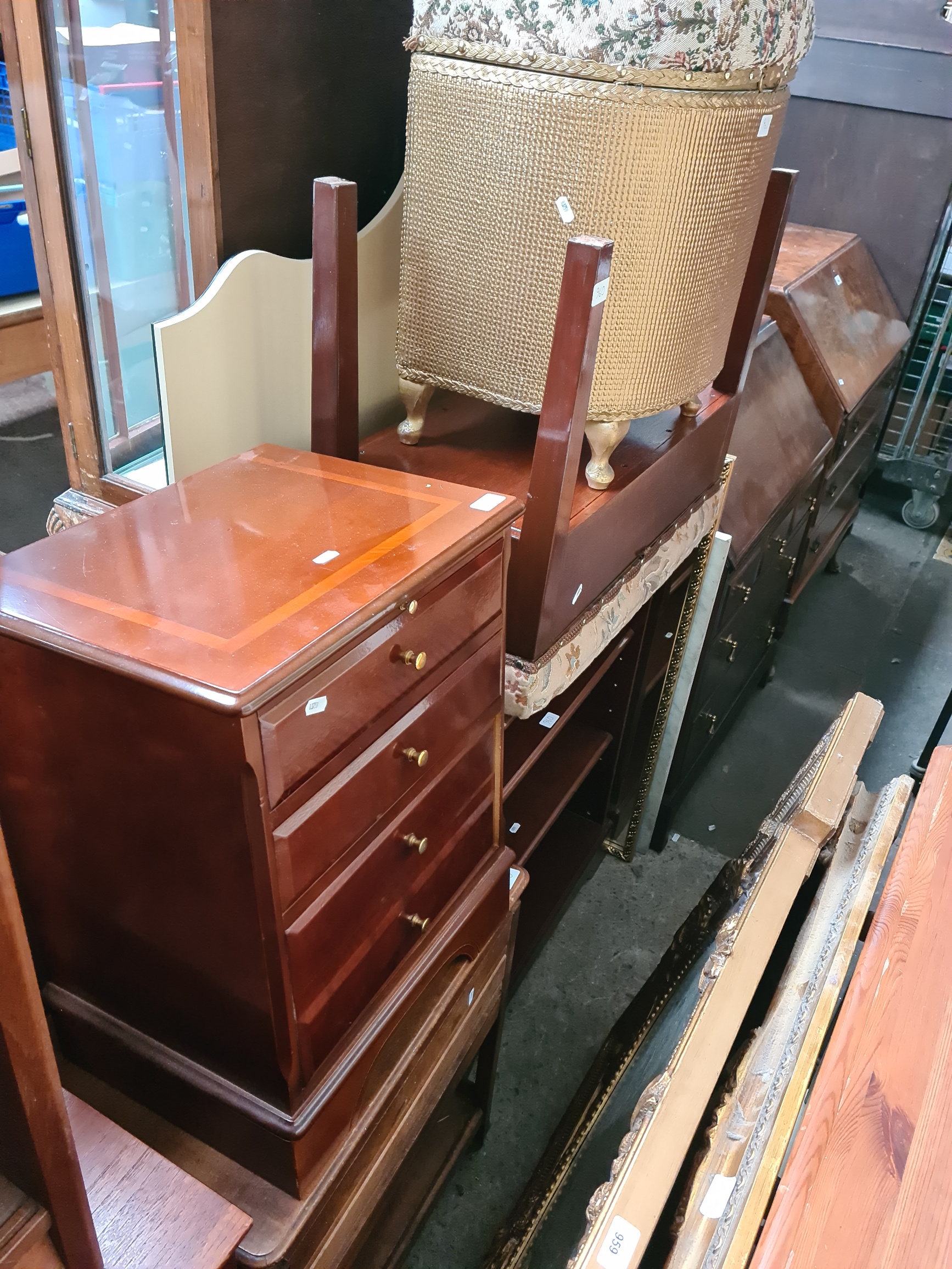 Various items of furniture; a mahogany bedside cabinet, a sewing table with accessories, a duet