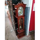 A Wood & Sons 31 day granddaughter clock with weights, pendulum and key.
