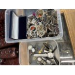 A box of costume jewellery and a box of watches.