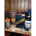 A Bells Decanter (full) in original box, a half bottle of VSOP Remy Martin fine champagne cognac,