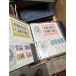 A box of albums of FDCs.