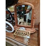 A mixed lot comprising a Victorian toilet mirror, a brass trivet and a silver plated standish.