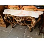 A French style giltwood side table with composite top.