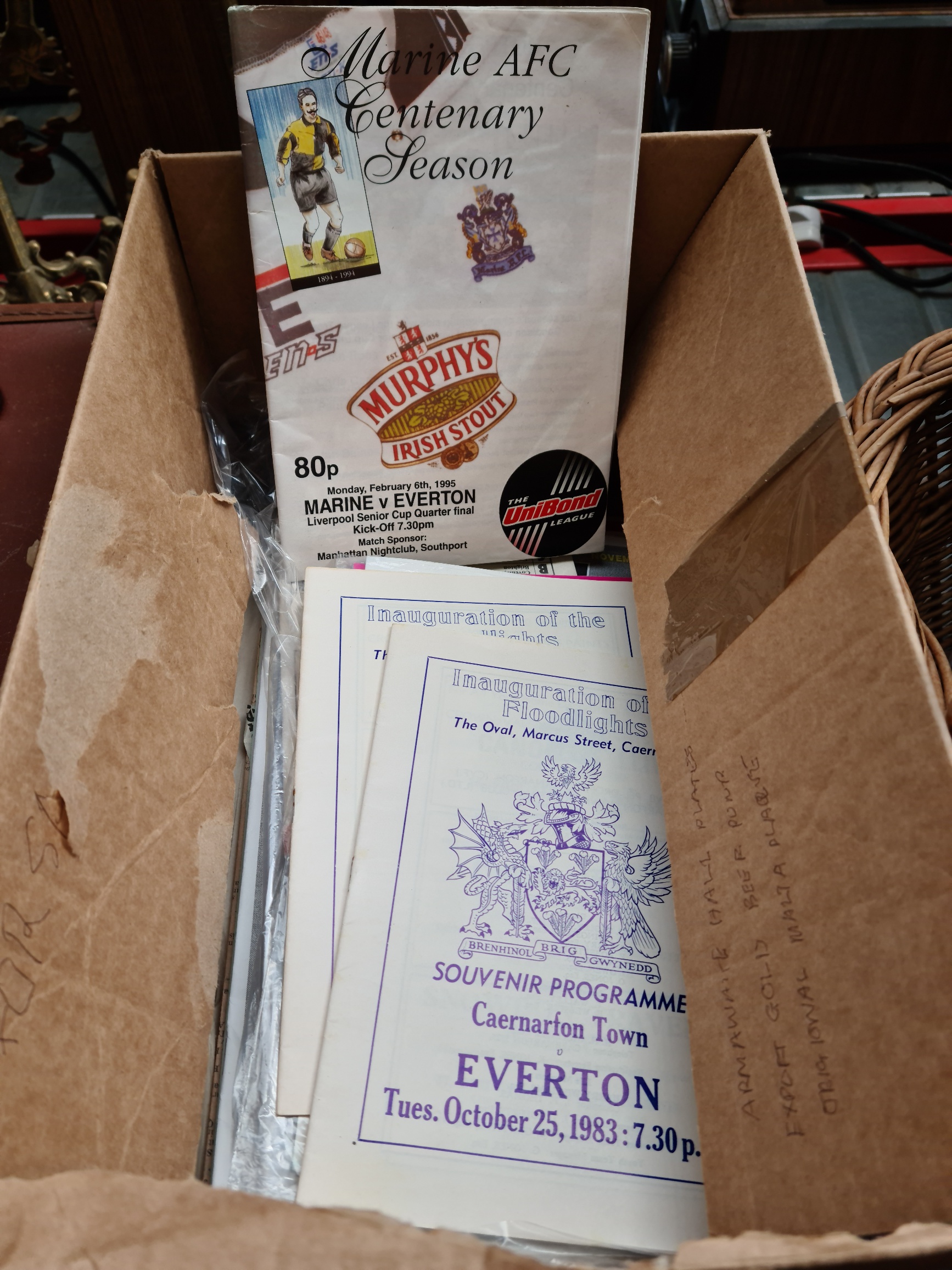 A box of football programmes, including several Everton away games, and Coventry City home games