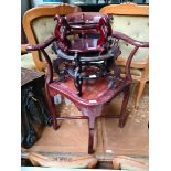 A Chinese carved hardwood corner chair and two Chinese carved wood stands.