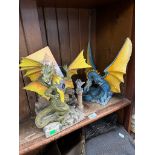 2 dragon figures, Ianitrx, keeper of the Labyrinth, and Enchantica