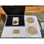 A boxed Paddington bear 50p & 2 Centenary commemorative coins