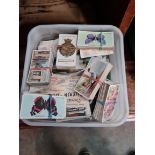 A box of cigarette and picture cards.