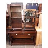 A mahogany two drawer side table and two oak bookcases.