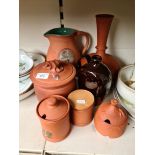 8 terracotta items, makers including Fulham Pottery and Torquay