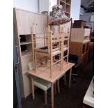 Various items of furniture; a dining table and chairs, lounge units, a white bedside cabinet, a