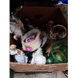 A box of mixed ceramics and glass including paperweights, glass dome, Royal Worcester figurines,