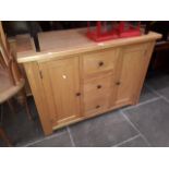 A modern light oak sideboard, width 110cm.