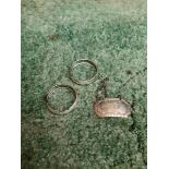 Silver sherry label and two silver serviette rings