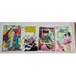 Four vintage comics.