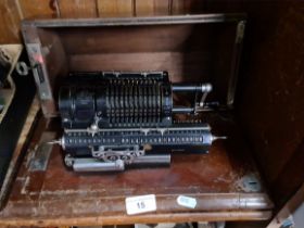 A cased Britanic calculating machine.