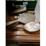 Four silver backed dressing table items and some watches