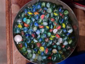 A sweet tin of marbles.