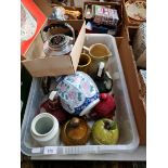 A box of assorted items, mainly pottery, vintage car kettle and a bag of annuals.