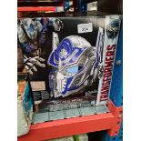 A Transformers toy helmet in box.