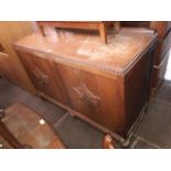 A 1930s oak sideboard.