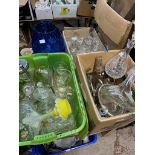 Three boxes of glassware and a large blue glass