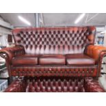 A brown leather Chesterfield 3 seater sofa.