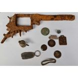 A selection of metal detecting finds to include old revolver, etc.