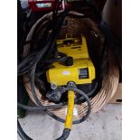 A Karcher 580 pressure washer and a wicker basket.